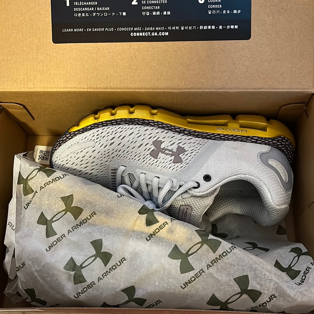 Blue and grey Under Armour trainers